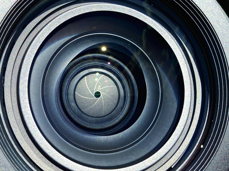 a close up view of a camera lens, by David Donaldson, everything enclosed in a circle, ((sharp focus))