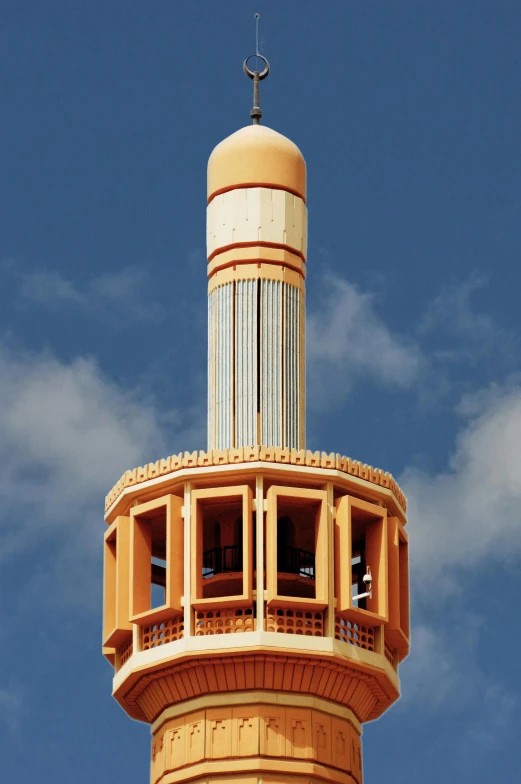 a tall tower with a clock on top of it, inspired by Victor Enrich, unsplash, art nouveau, oman, ventilation shafts, close-up from above, made of glazed