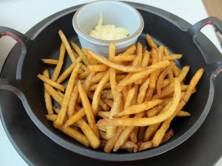 a pan filled with french fries sitting on top of a table, westside, sougetsu, white, small