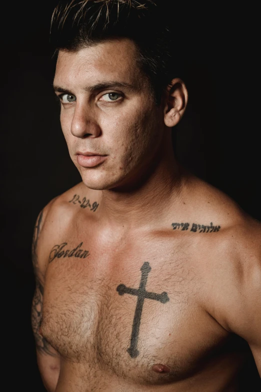 a man with a cross tattoo on his chest, inspired by Carlos Berlanga, trending on pexels, portrait of ben stiller, non binary model, bolsonaro, zyzz