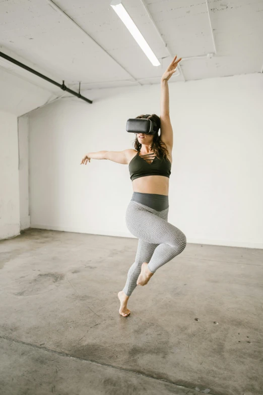 a woman jumping in the air in a room, a hologram, unsplash, vr goggles, akali, no - text no - logo, field of view