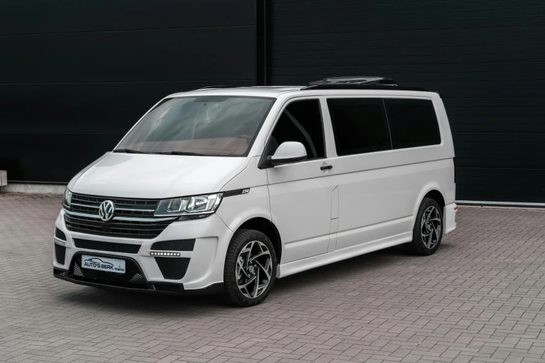 a white van parked in front of a building, high end interior, garis edelweiss, extremely polished, front top side view