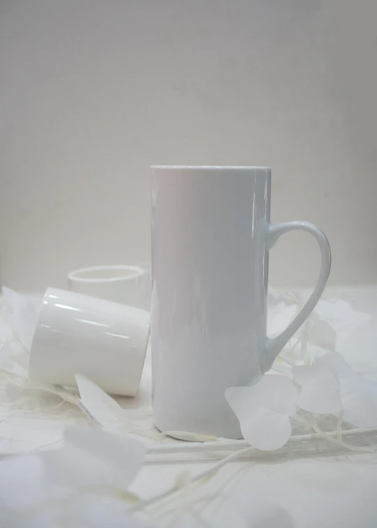 a white coffee cup sitting on top of a pile of toilet paper, inspired by Hendrik Gerritsz Pot, unsplash, process art, tall iced tea glass, back view also, made of all white ceramic tiles, glossy white