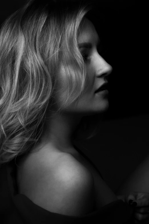 a black and white photo of a woman, inspired by George Hurrell, featured on cgsociety, photorealism, side profile waist up portrait, portrait of a blonde woman, vivid), curved