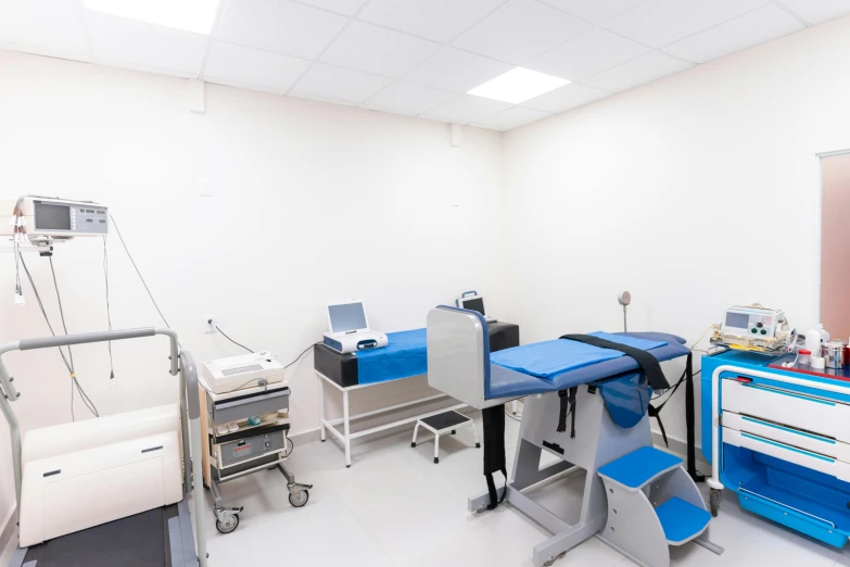 a hospital room with a lot of medical equipment, a photo, by Adam Marczyński, private press, white wall coloured workshop, thumbnail, profile image, interior of a small
