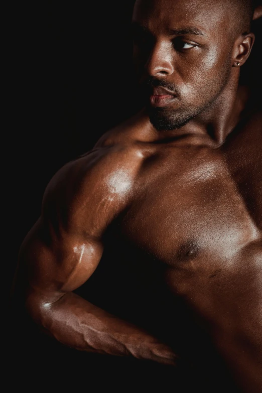 a shirtless man standing in front of a black background, steroid use, with brown skin, instagram photo, intricated