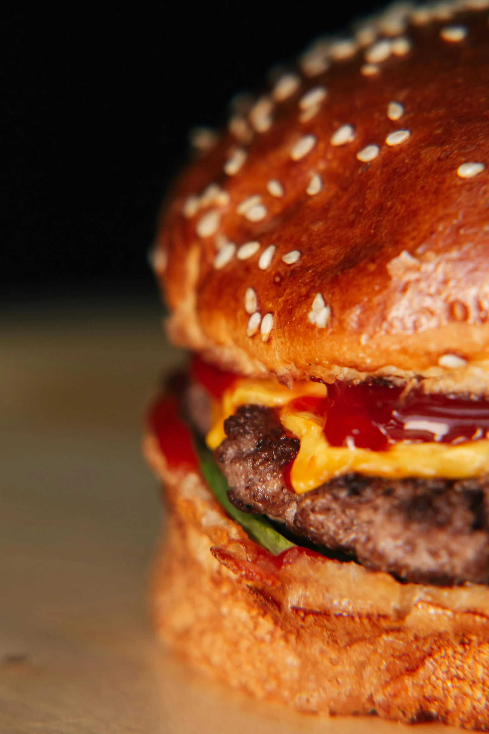 a hamburger sitting on top of a wooden table, pexels, hyperrealism, frontal close up, high quality photo, b - roll, crispy