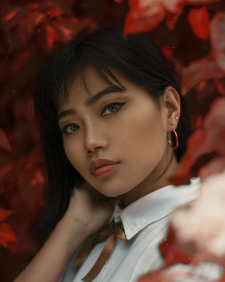 a woman in a white shirt and tie posing for a picture, an album cover, inspired by Li Fangying, trending on pexels, sumatraism, red leaves, non binary model, lalisa manobal, 5 0 0 px models