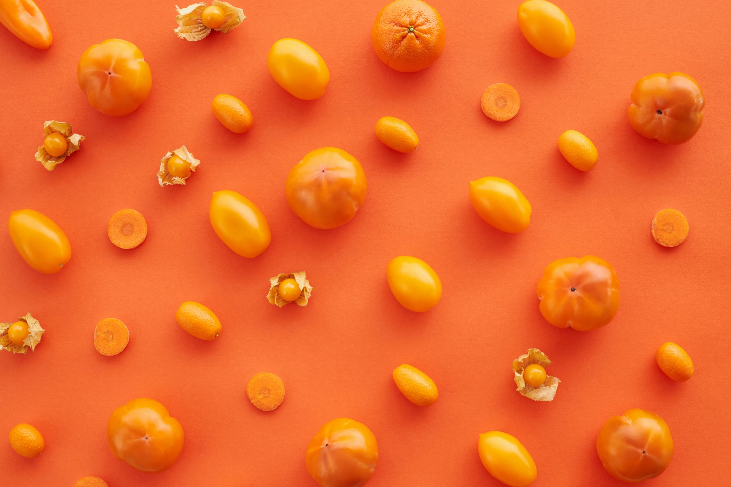 a bunch of yellow tomatoes on an orange background, by Carey Morris, trending on unsplash, embedded with gemstones, jelly - like texture, grey orange, various posed