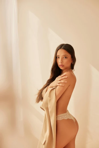 a woman in lingerie posing for a picture, light tan, side portrait imagery, basia tran, mai anh tran