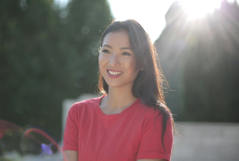 a woman in a red shirt smiles at the camera, pexels contest winner, shin hanga, avatar image, sunlit, profile image, scientific photo