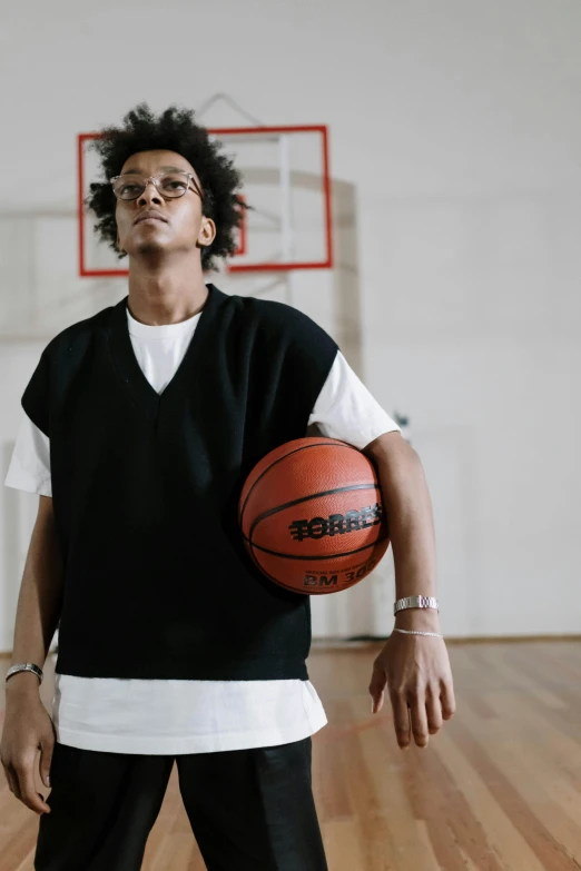 a man standing in a basketball court holding a basketball, inspired by Xanthus Russell Smith, trending on dribble, curls on top, white sleeves, sport glasses, black teenage boy