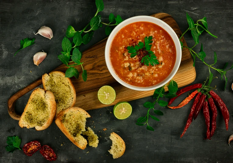 a bowl of soup sitting on top of a wooden cutting board, by Adam Marczyński, pexels contest winner, renaissance, made of baked beans, middle eastern, thumbnail, square