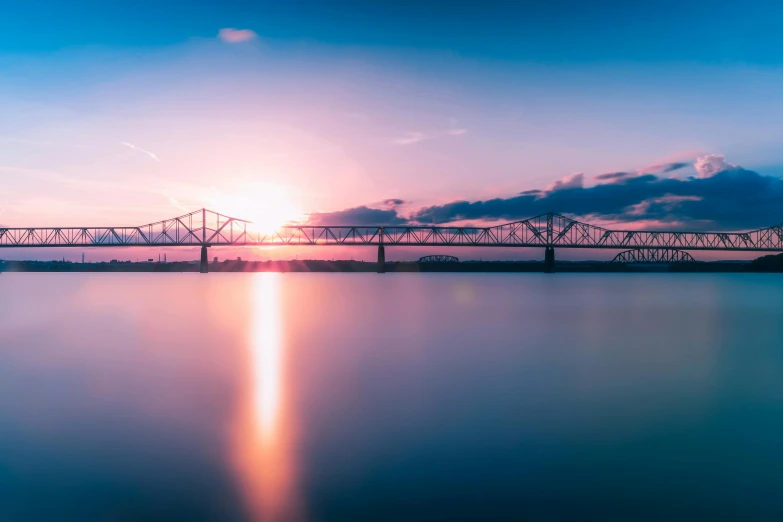 a bridge over a large body of water, pexels contest winner, memphis, sunset panorama, high quality print, calcutta