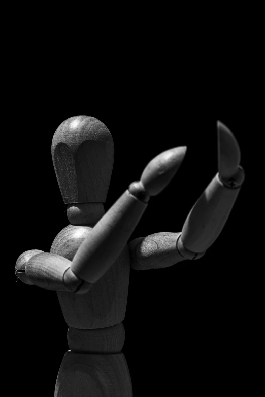 a black and white photo of a wooden mannequin, a surrealist sculpture, by Doug Ohlson, pixabay contest winner, dabbing, animation character, pepper, hurt
