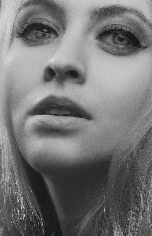 a black and white photo of a woman with long hair, a black and white photo, reddit, photorealism, chloë grace moretz, neck zoomed in from lips down, kerli koiv, monochrome 3 d model