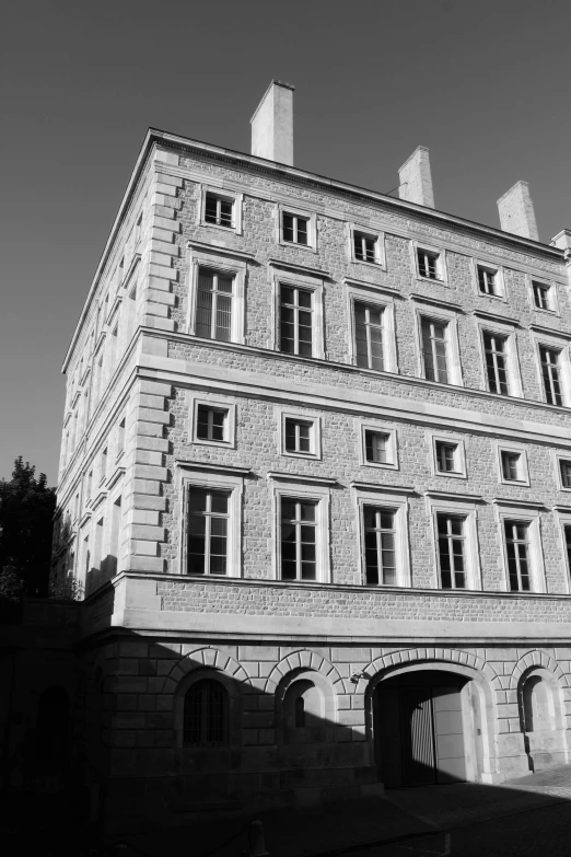 a black and white photo of a building, a black and white photo, inspired by Alexandre Falguière, paris school, limestone, corot, biedermeier, portrait!!!