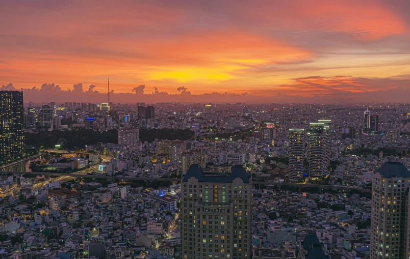 an aerial view of a city at sunset, pexels contest winner, vietnam, square, banner, skyline