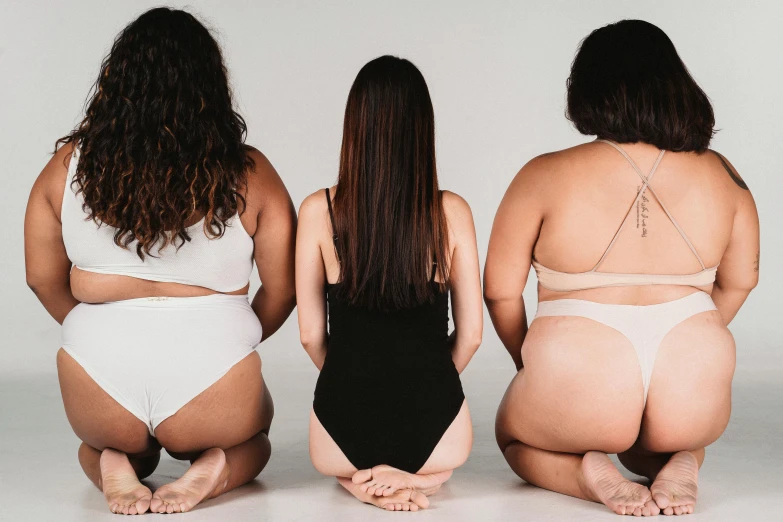 three women in underwear sitting next to each other, unsplash, standing with her back to us, different shapes and sizes, three body problem, profile image