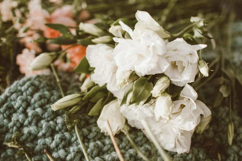 a bunch of flowers sitting on top of a table, unsplash, romanticism, sea - green and white clothes, close-up photo, handcrafted, thumbnail