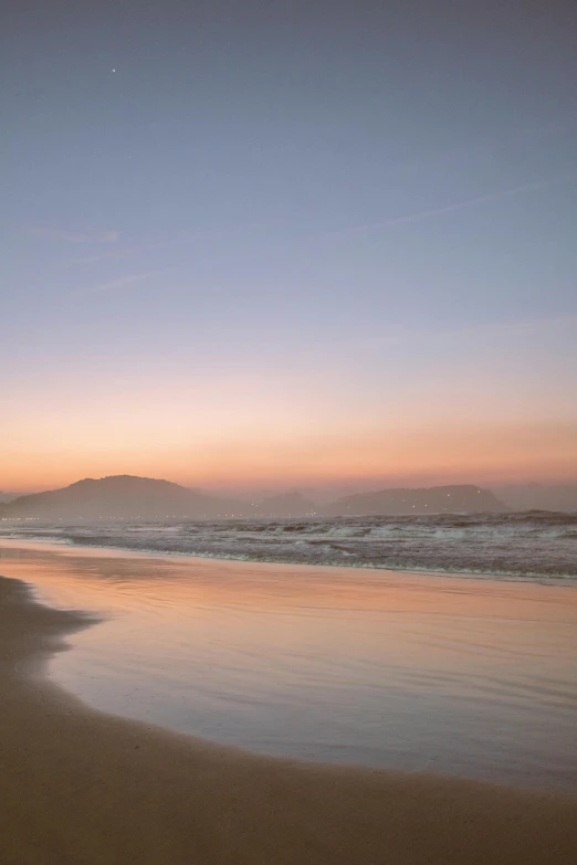 a man riding a surfboard on top of a sandy beach, pink mist, south african coast, oscar niemeyer, a colorful