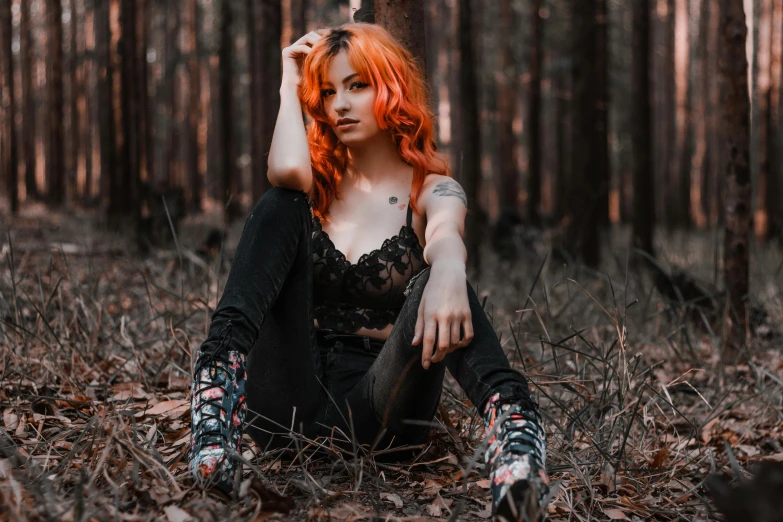 a woman with red hair sitting in the woods, an album cover, inspired by Elsa Bleda, pexels contest winner, wearing a punk outfit, black and orange colour palette, young beautiful amouranth, casual pose