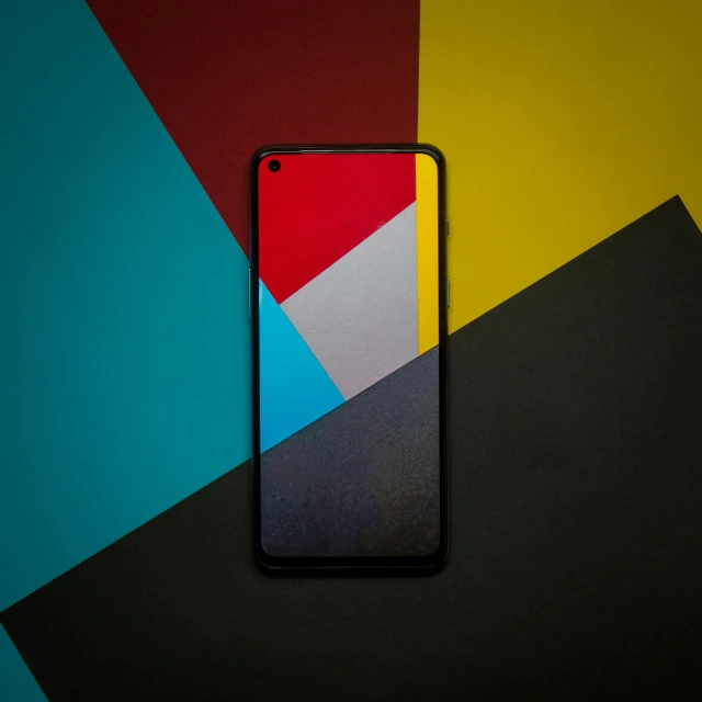 a close up of a cell phone on a colorful background, a picture, by Matthias Stom, trending on pexels, geometric abstract art, black and yellow and red scheme, android close to camera, square, wallpaper for monitor