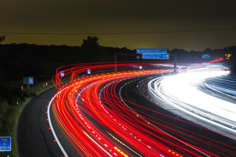 a highway filled with lots of traffic at night, an album cover, unsplash, visual art, electrical arcs, red rim light, thumbnail, fan favorite