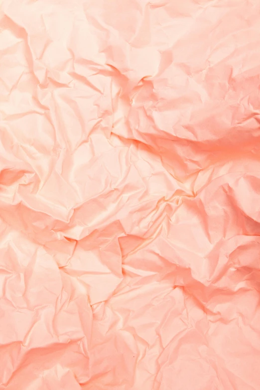 a close up of a sheet of pink crinkled paper, inspired by Christo, pexels contest winner, light orange values, made of cotton candy, coral, my pov