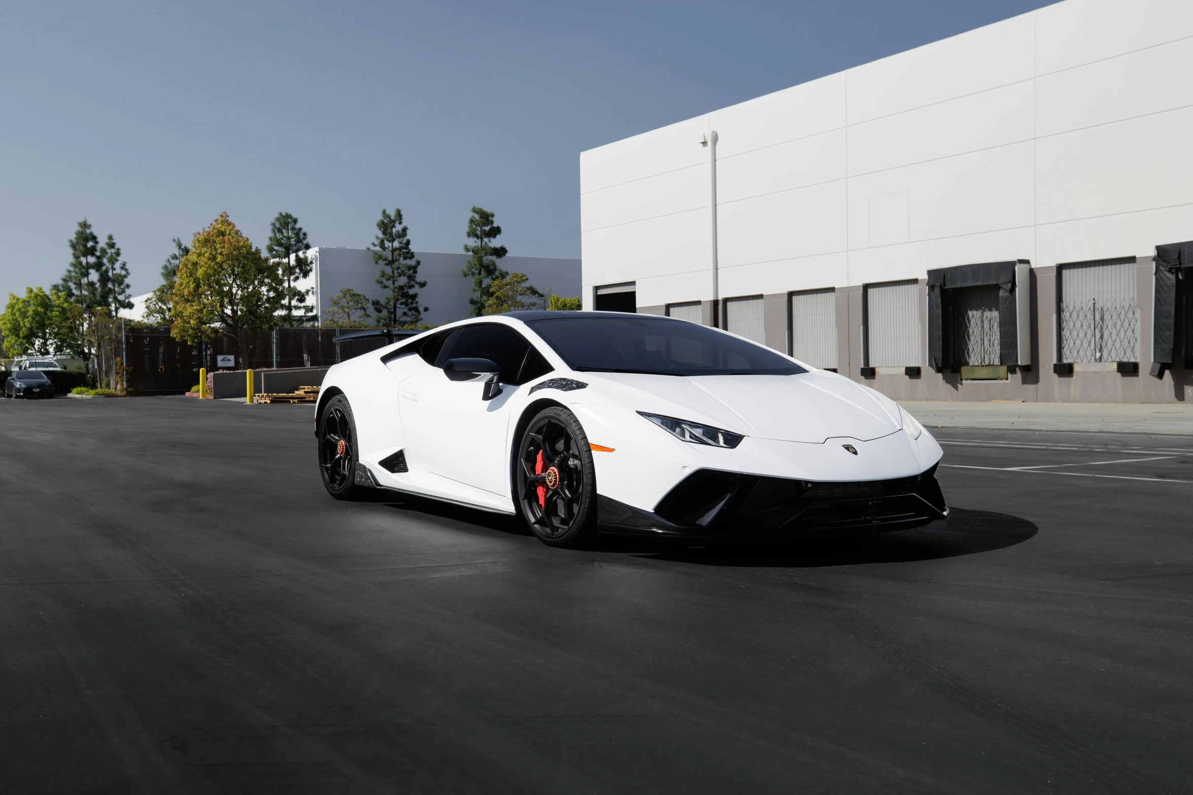 a white lambino parked in front of a building, lamborghini, matt white ice color armor, from 8 k matte, white on black