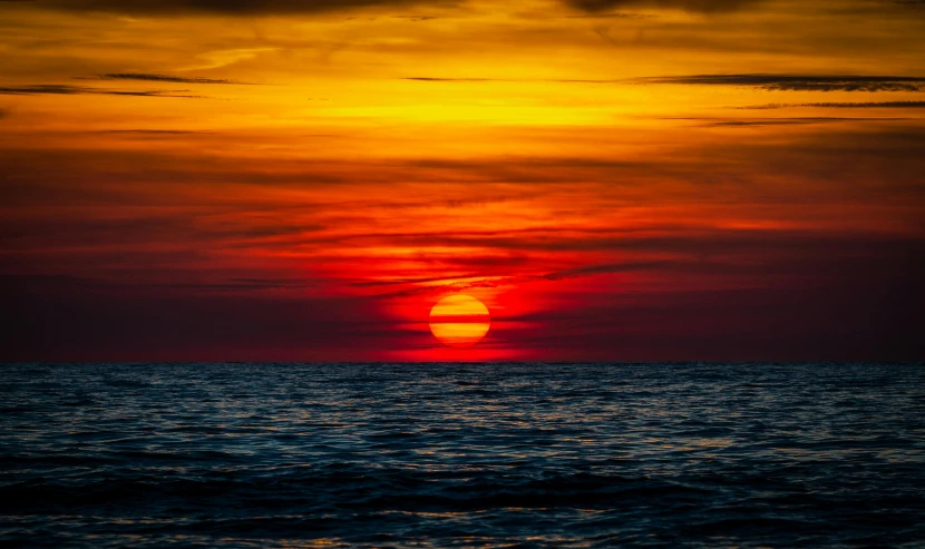 the sun is setting on the horizon of the ocean, by Jan Tengnagel, pexels contest winner, red yellow, deep colours. ”, post processed, rectangle