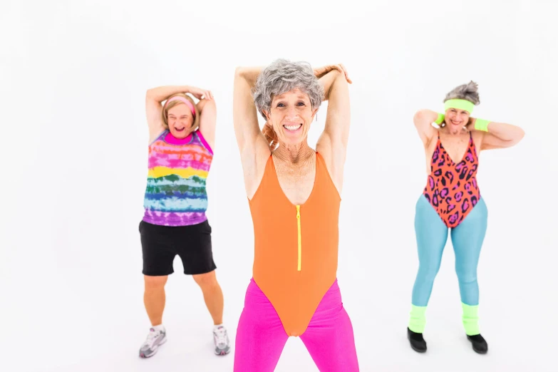 a group of older women doing zumba zumba zumba zumba zumba zumba zumba zumba zumba zumba zumba, by Pamela Drew, kitsch movement, set against a white background, skintight rainbow body suit, cottagecore!! fitness body, 3 heads