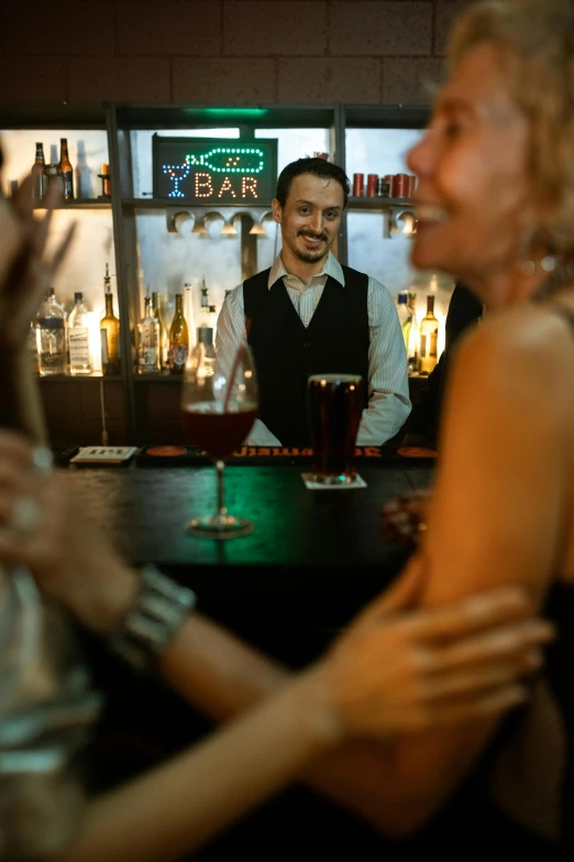 a woman standing next to a man at a bar, pexels, renaissance, woman holding another woman, a still of a happy, low key, thumbnail