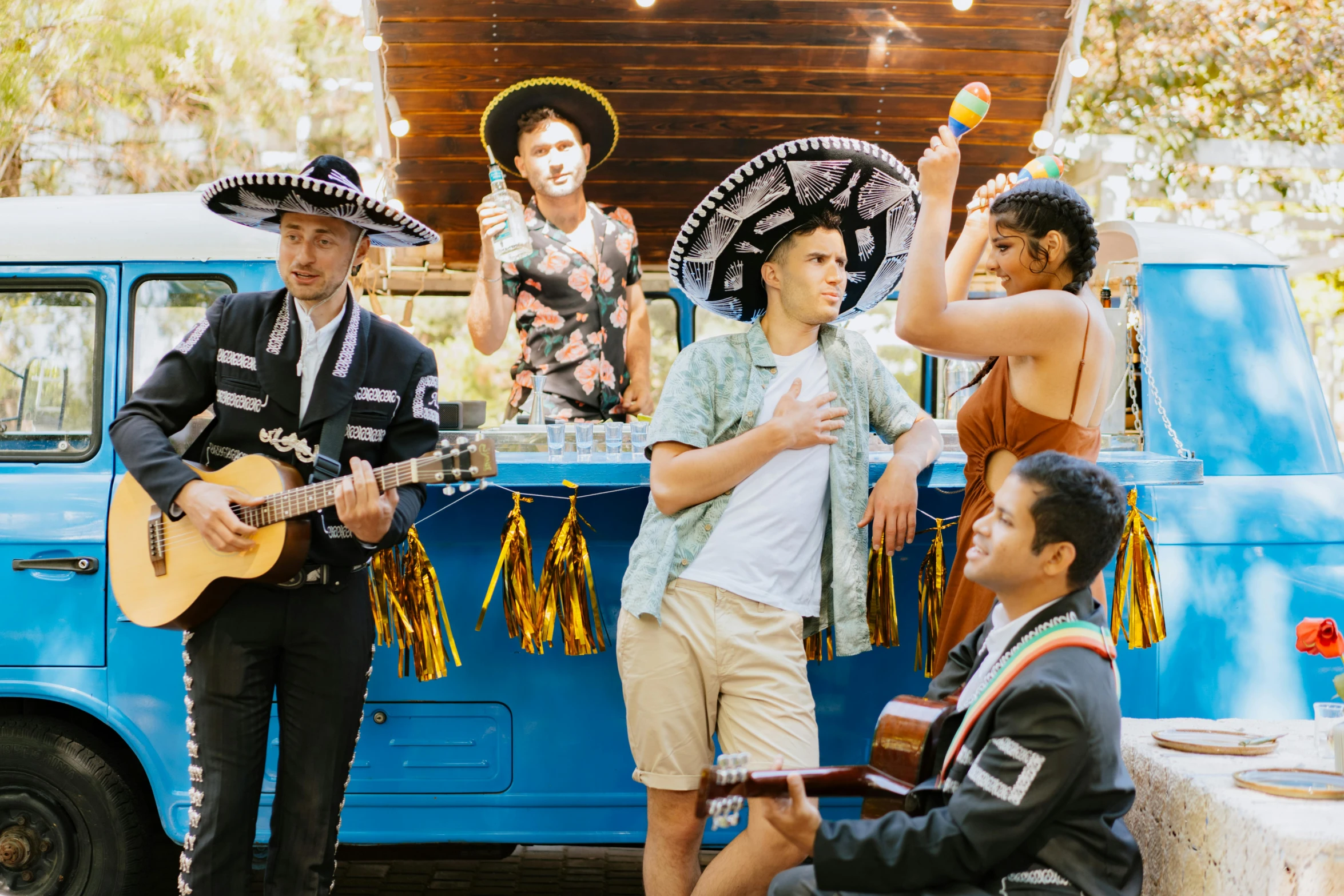 a group of people that are standing in front of a truck, pexels contest winner, renaissance, wearing sombrero, band playing, aussie baristas, avatar image