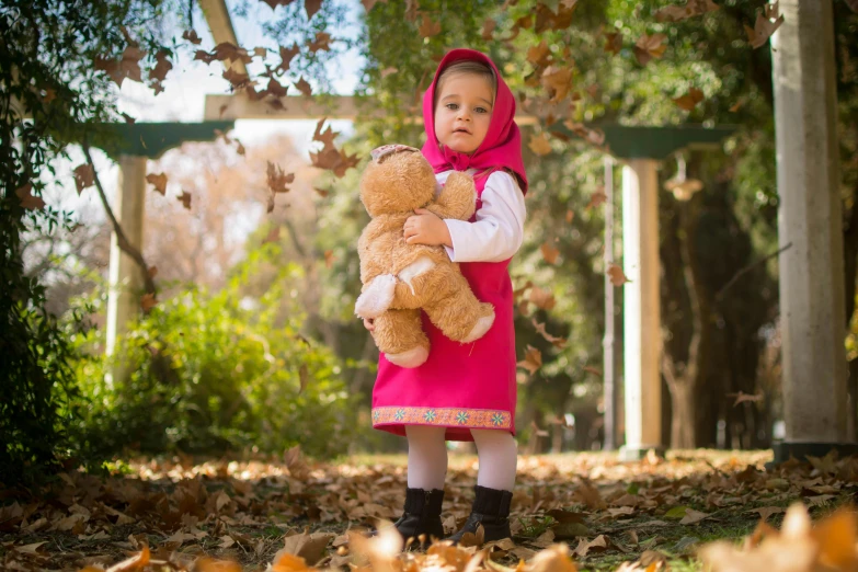 a little girl in a pink dress holding a teddy bear, a portrait, pixabay contest winner, qajar art, tehran, autumn season, full body photoshoot, long dress with apron