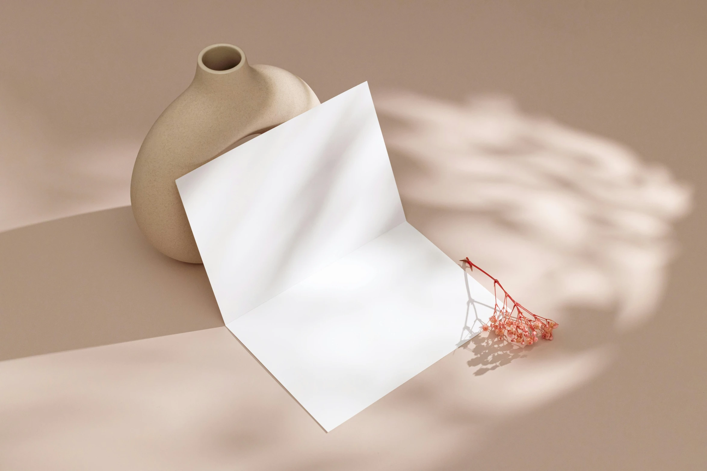 a vase sitting on top of a table next to a piece of paper, by Marion Ancrum, unsplash contest winner, arabesque, pale red, blank background, writing a letter, rendered in povray