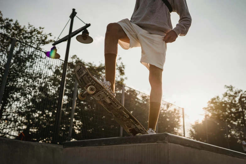 a man riding a skateboard up the side of a ramp, pexels contest winner, standing on top of a piano, summer evening, prosthetic leg, male calisthenics