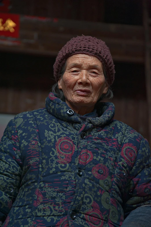 a man and a woman standing next to each other, inspired by Liu Jue, pexels contest winner, portrait 6 0 - year - old woman, young himalayan woman, color footage, cold