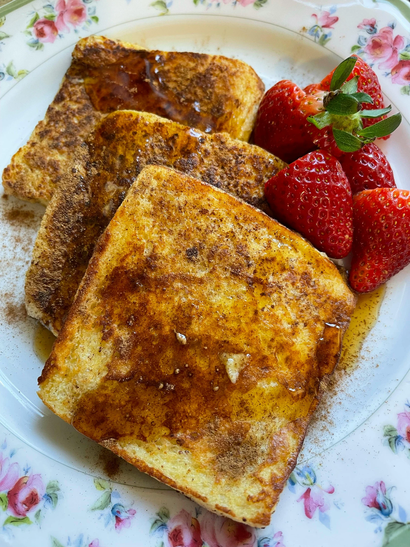 a white plate topped with french toast and strawberries, renaissance, 6 pack, cinnamon, award winning, chilean