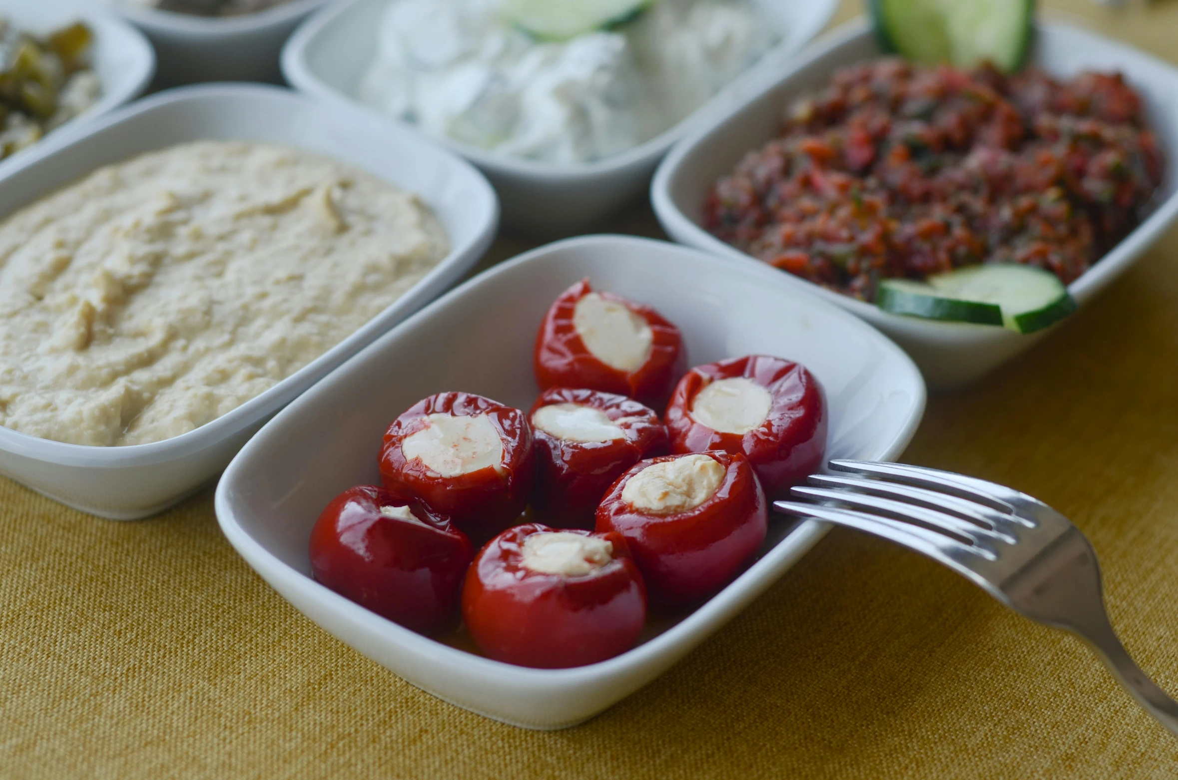 a table topped with bowls of food and a fork, dau-al-set, red hoods, caparisons, thumbnail, cherries