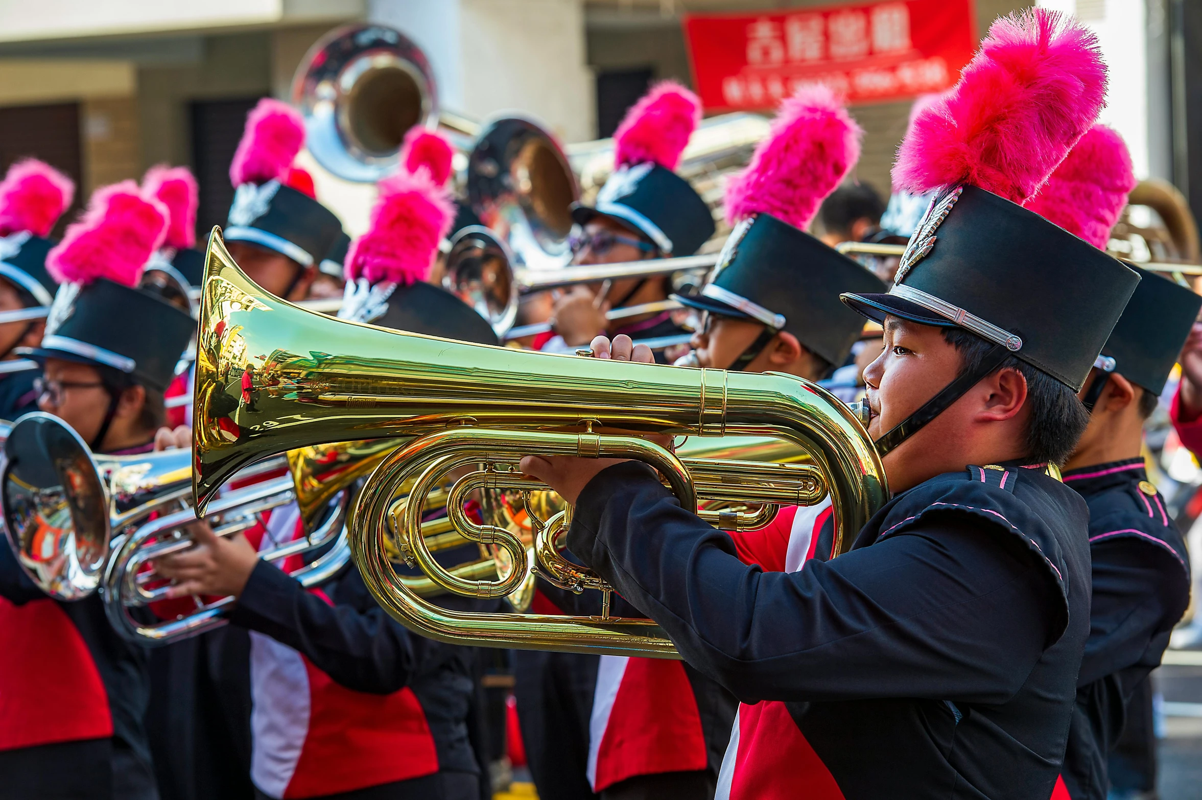 a marching band is performing in a parade, pexels contest winner, kowloon, avatar image, profile pic, tuba