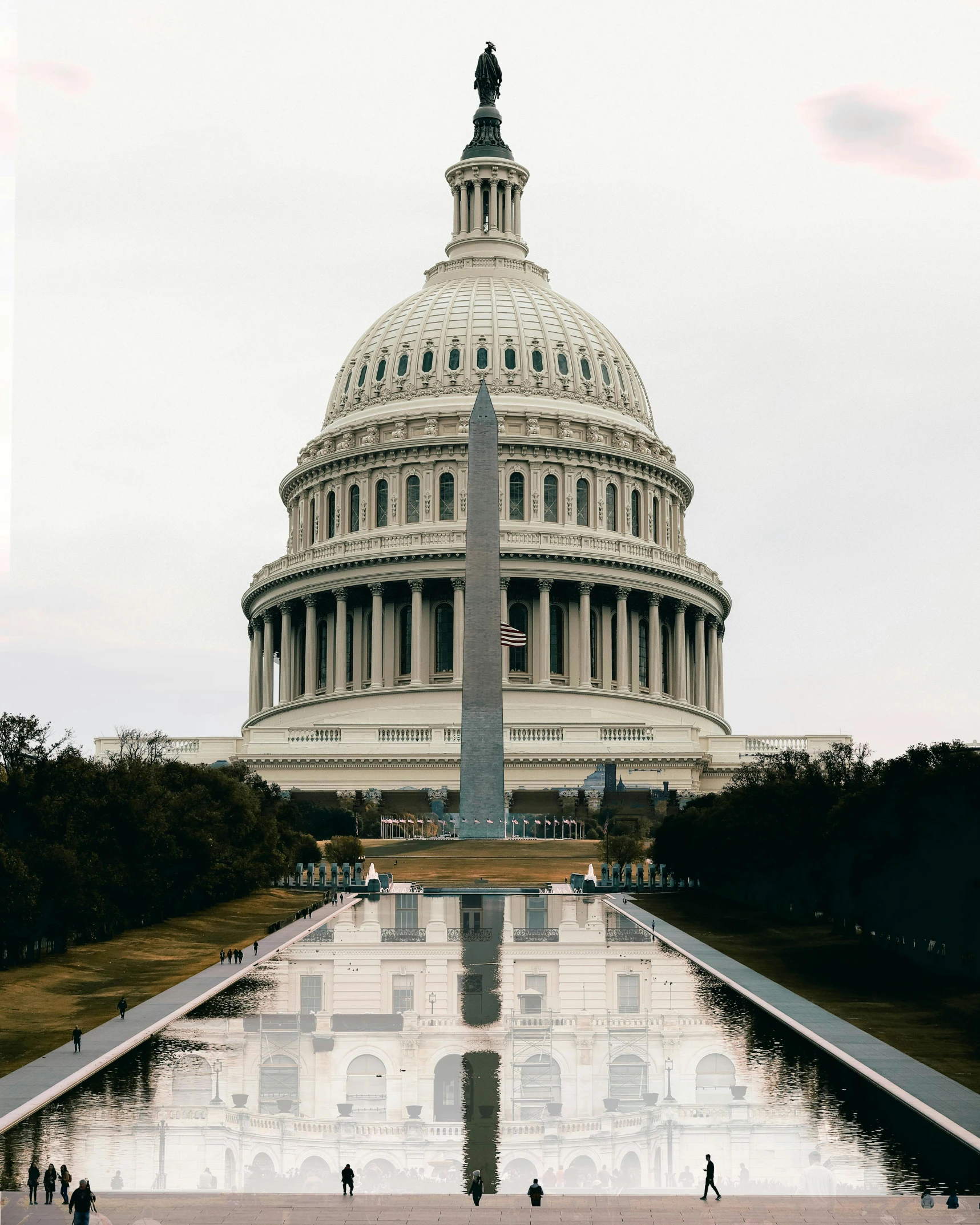 a view of the capitol building from the reflecting pool, unsplash contest winner, neoclassicism, lgbtq, background image, concrete building, 🚿🗝📝