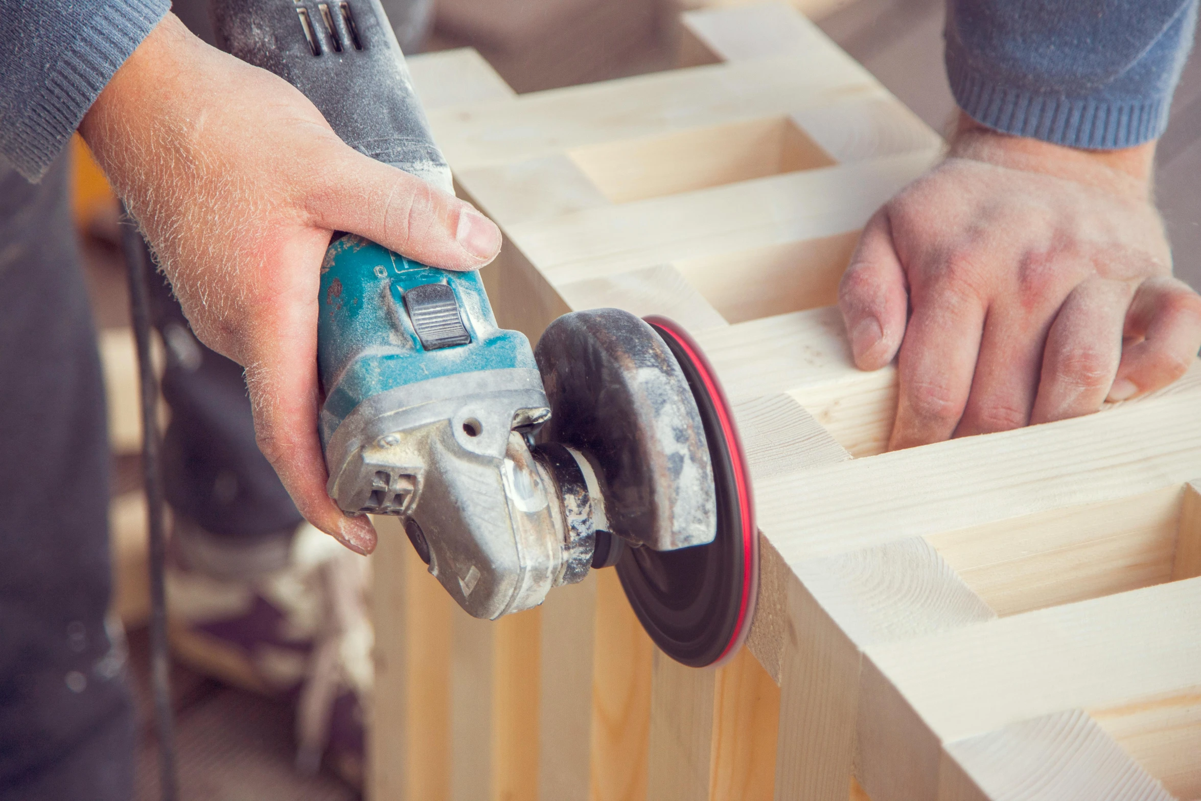 a person using a grinder on a piece of wood, by Matthias Stom, pexels contest winner, arbeitsrat für kunst, construction, geometrical, 15081959 21121991 01012000 4k, panels