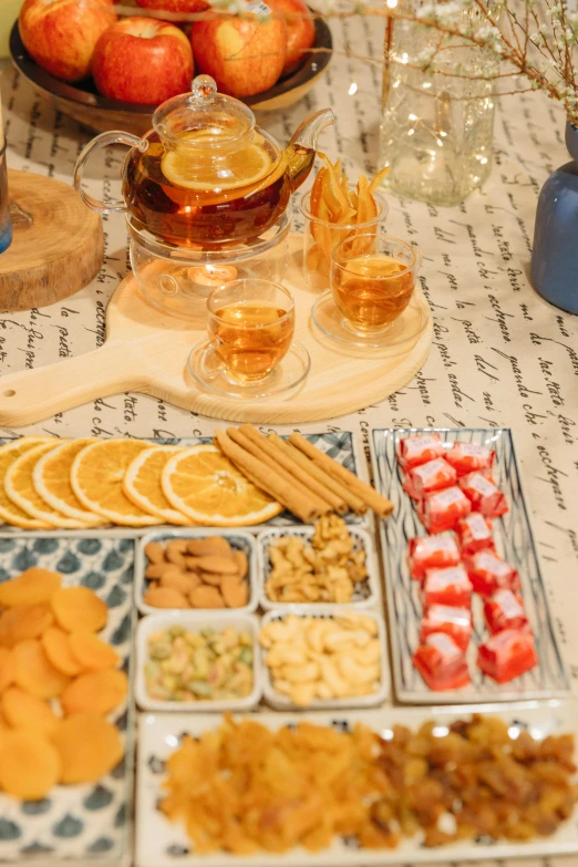 a table that has a lot of food on it, a still life, pexels, amber and blue color scheme, marmalade, rum, thumbnail