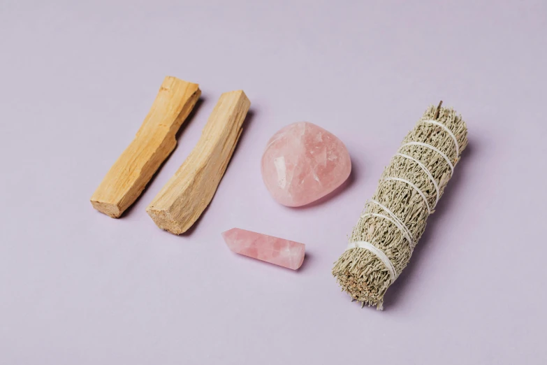 a palo palo palo palo palo palo palo palo palo palo palo palo palo palo palo palo palo, a still life, inspired by Eden Box, trending on pexels, minimalism, rose quartz, wooden magic wand, sparkling crystals, natural tpose