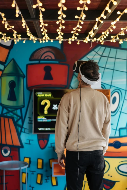 a man standing in front of a colorful wall, a cartoon, trending on pexels, interactive art, wearing gaming headset, facing away from camera, maze, gambling