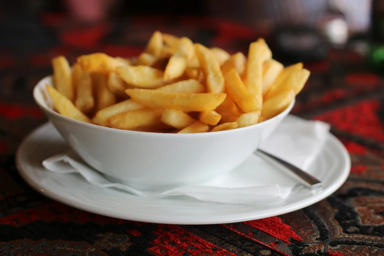 a bowl of french fries on a plate, pexels, hurufiyya, new zealand, unedited, ethiopian, soup