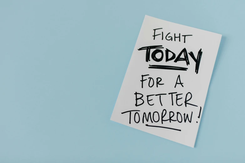 a piece of paper with the words fight today for a better tomorrow written on it, by Julia Pishtar, on a canva, healthcare, pr shoot, 3 4 5 3 1