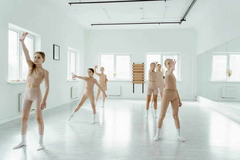 a group of people that are standing in a room, inspired by Vanessa Beecroft, trending on pexels, female dancer, teen girl, decoration, 15081959 21121991 01012000 4k