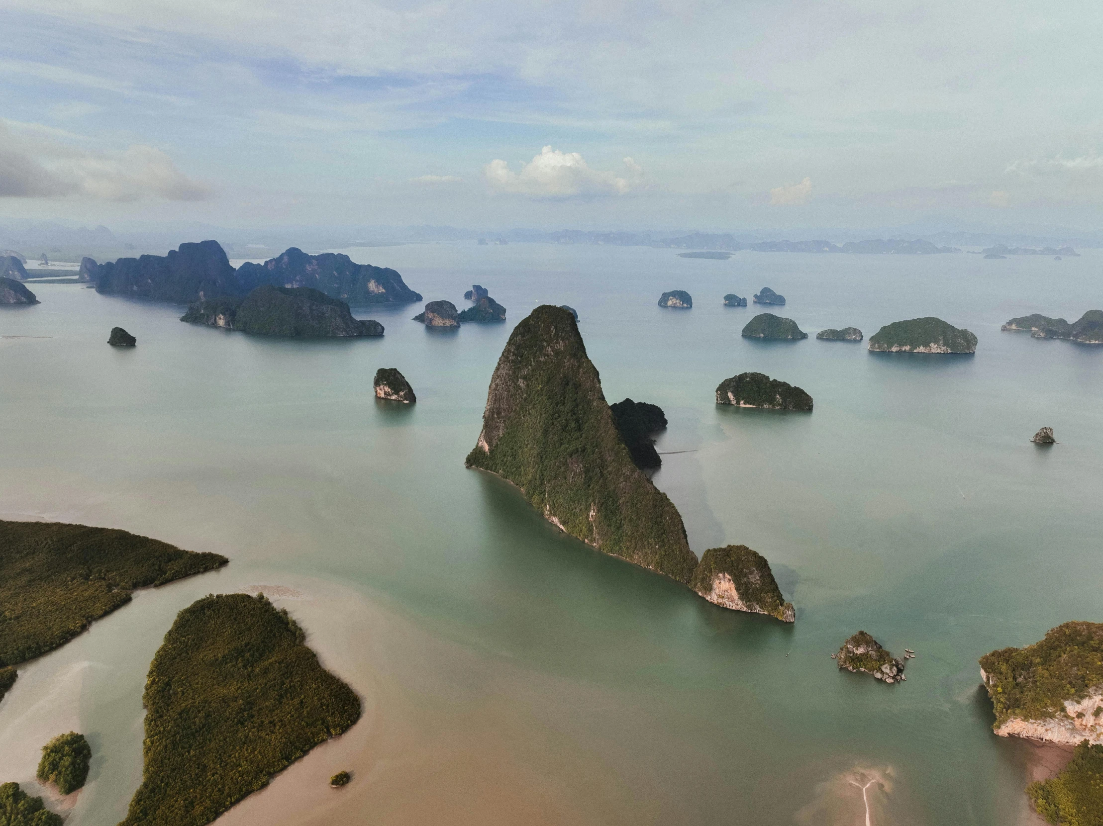 an aerial view of a large body of water, inspired by Steve McCurry, pexels contest winner, hyperrealism, thai, flying rocky island, thumbnail, high res 8k